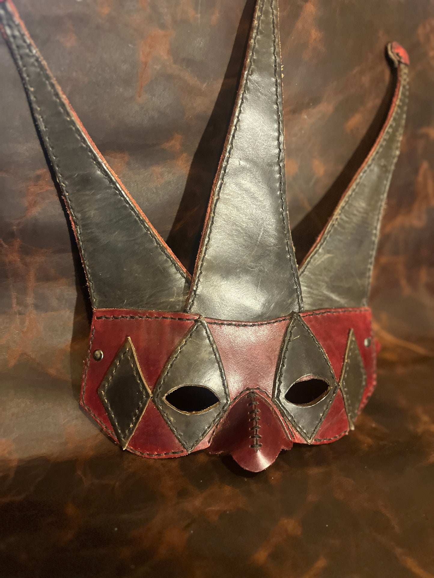 Handcrafted Leather Jester Mask - Red and Black Adjustable Mask for Cosplay, LARP, or Display