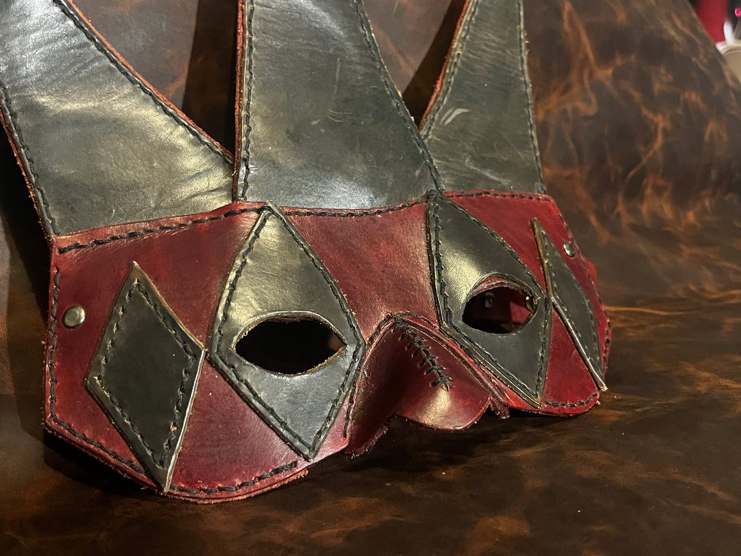 Handcrafted Leather Jester Mask - Red and Black Adjustable Mask for Cosplay, LARP, or Display